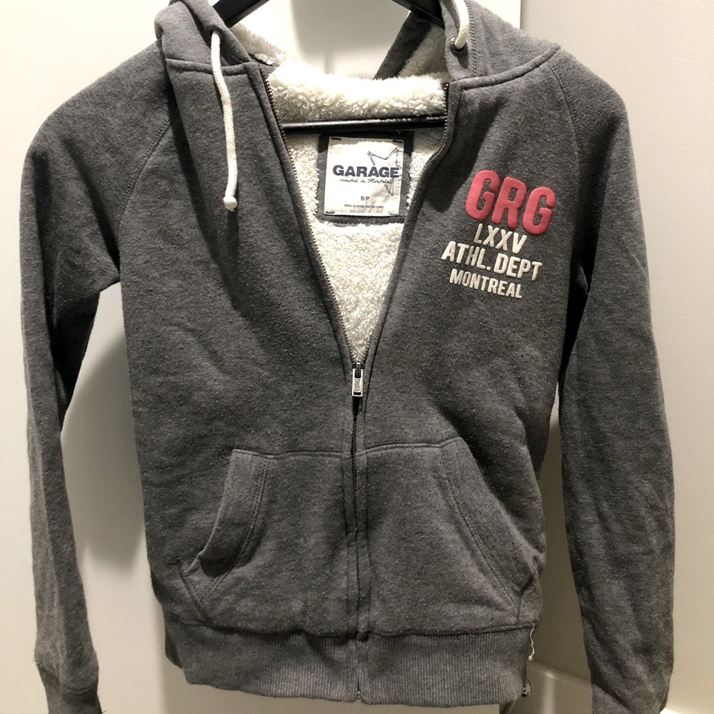 Grey Garage zip-up jacket size small.